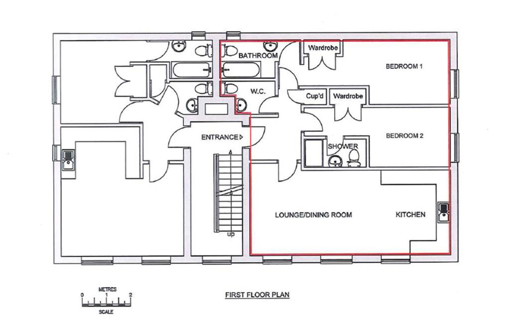 Lot: 58 - ENTIRE FREEHOLD BUILDING OF SIX FLATS, ALL LET ON ASSURED SHORTHOLD TENANCIES - Second floor plan with 2 bed edged in red